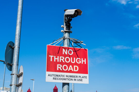 ANPR or Automatic Number Plate Recognition camera reading car registration plate