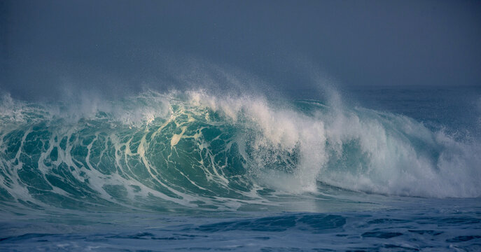 Ocean scenery with copyspace. Huge waves crashing in ocean. Seascape environment background. Water texture with foam and splashes. Hawaiian surfing at Northshore in Oahy island
