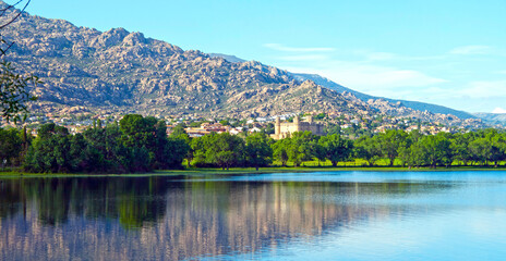 Manzanares El Real Castle, Lake and Rocky Mountains Landscape © clavivs
