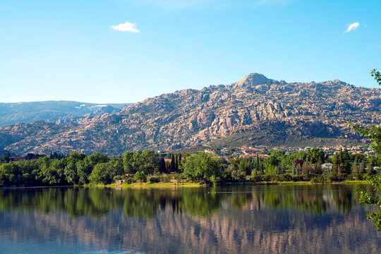 Serene Lake Reflection with Granitic Mountains