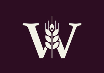 Minimalist letter W logo with wheat stalk for bakery © alpen
