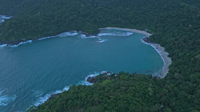 Drone flying over red island tropical beach in java