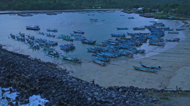 Indonesian fishing boats moored at red island java harbor