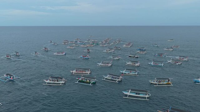 Traditional balinese jukung boats on dolphin watching tour