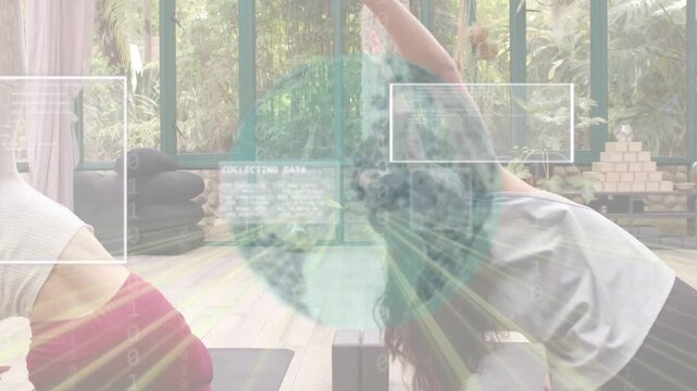Two women doing yoga on mats, deepening backbend as globe overlay over mats collecting health data