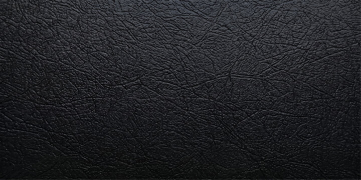 A detailed close-up shot revealing a rich, textured surface of sleek, black leather. The subtle interplay of light and shadow, highlighting the material's depth and tactile quality.