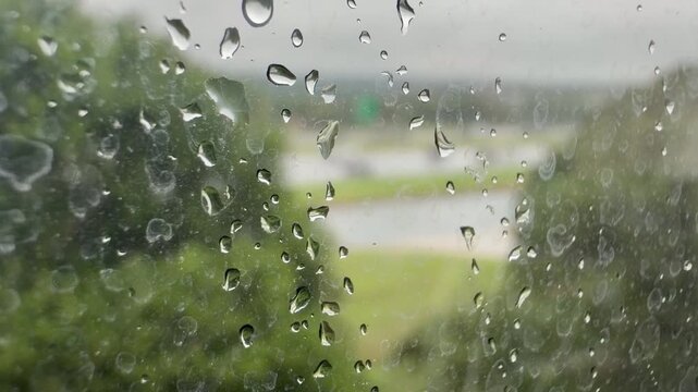 Traffic with raindrop reflection n window 