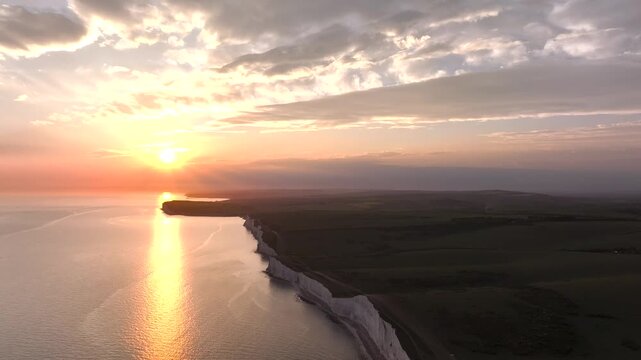 Sunset over Seven Sisters Cliffs from a drone, English Channel, East Sussex, South-east England