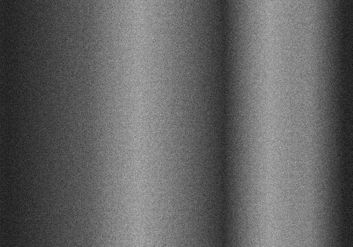 Dark brushed metal texture with gradient light reflection showing industrial steel surface design backdrop for creative projects