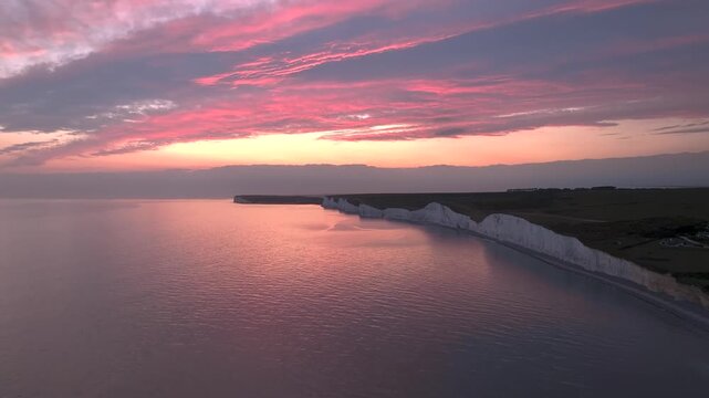 Sunset over Seven Sisters Cliffs from a drone, English Channel, East Sussex, South-east England