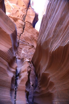 Antelope Canyon is a slot canyon in the American Southwest on Navajo land in Arizona. Antelope Canyon was formed by the erosion of Navajo Sandstone due to flash flooding from rainwater.