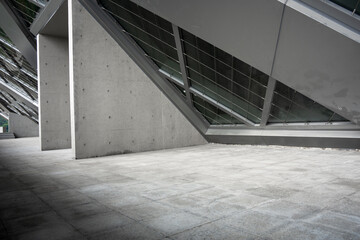 Naklejka premium Interior space of modern architecture featuring concrete structural elements and geometric design