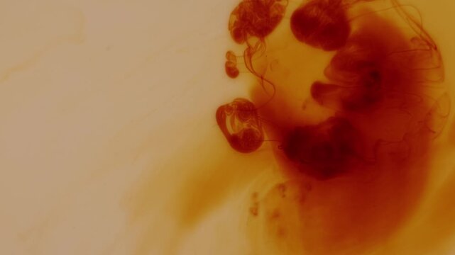 Fluid abstract composition with iodine mixing in water and forming dynamic patterns