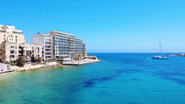 Enjoying the View of Clear Blue Water and Boats in Sliema Malta on a Sunny Day in September
