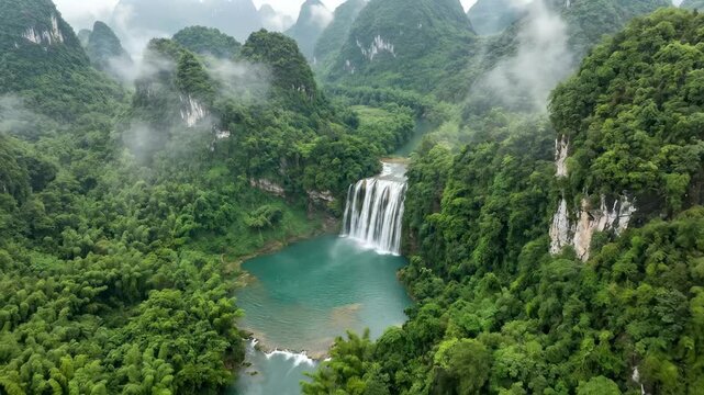 Stunning Waterfall in Lush Tropical Mountains of Guilin China