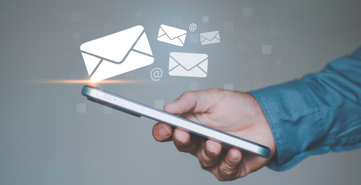 Digital email communication and messaging, online communication, business notification, email marketing, customer contact and modern mobile communication system. Envelope icons on smartphone