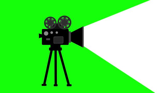 A vintage movie projector with spinning reels and a bright white light beam on a green screen background.