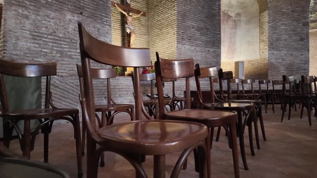 Row Of Antique Wooden Pews Inside Historic Catholic Church Interior