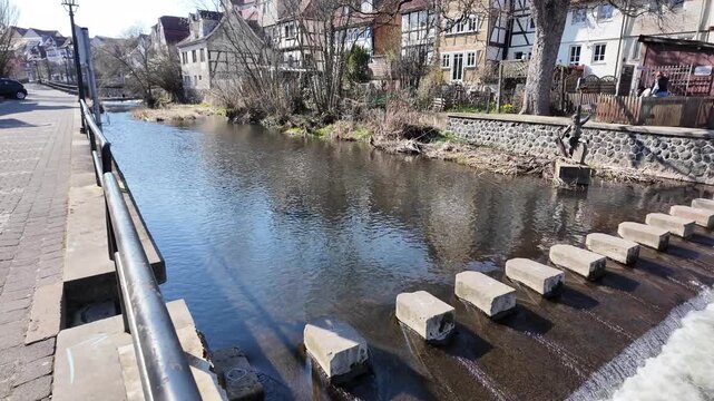 Historic Lauter River With Water Stepping Stones In Lauterbach Germany