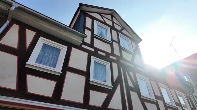 Narrow Cobblestone Street With Half Timbered Houses In Lauterbach