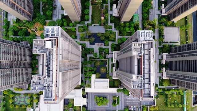 Aerial view of modern high-rise residential complex and urban housing development.