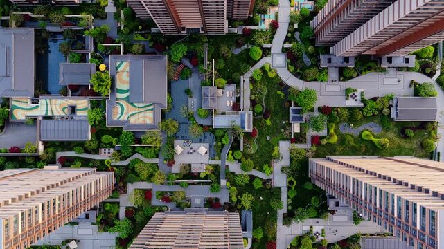 Aerial view of modern high-rise residential complex and urban housing development.