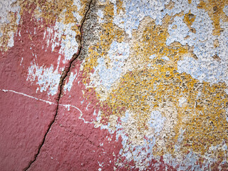 Fototapeta premium Distressed Grunge Wall with Peeling Layers of Old Paint