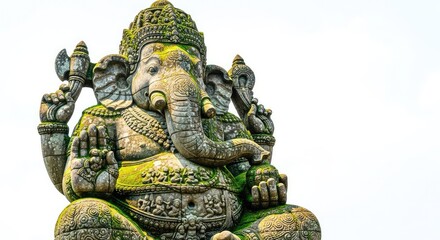 Fototapeta premium An enormous weathered stone sculpture of an elephant-headed deity shows intricate carvings, mossy textures, and grand scale in a calm area, sunlight, peaceful, aged