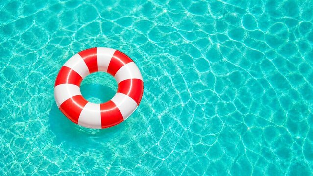 Red and White Swim Ring Floating in Clear Pool Water