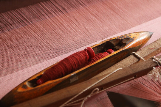 Handloom Shuttle on a loom.