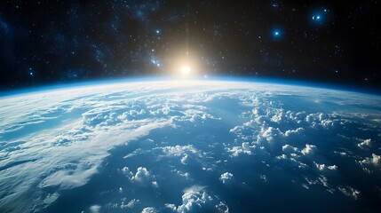 Fototapeta premium Sun rising over earth's cloudy atmosphere, viewed from space