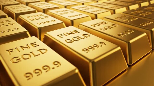 Stacked fine gold bars close-up