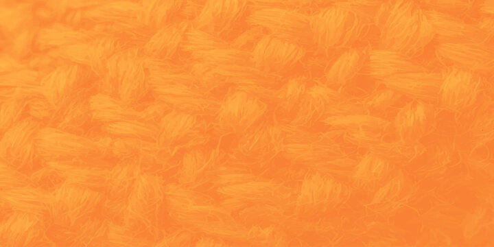 Vibrant orange knitted wool texture background with soft yarn weaving detail and cozy warmth for winter design concepts.