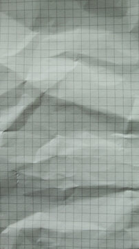 Wrinkled grid paper texture with visible folds, perfect for grunge style, overlays and textured design
