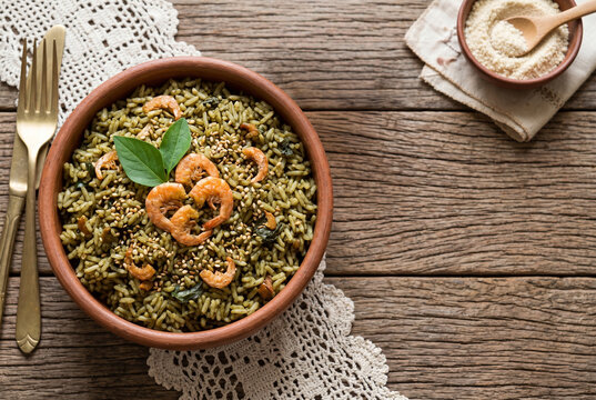 Top View of Arroz de Cuxa Brazilian Regional Specialty on Wooden Background with Copy Space