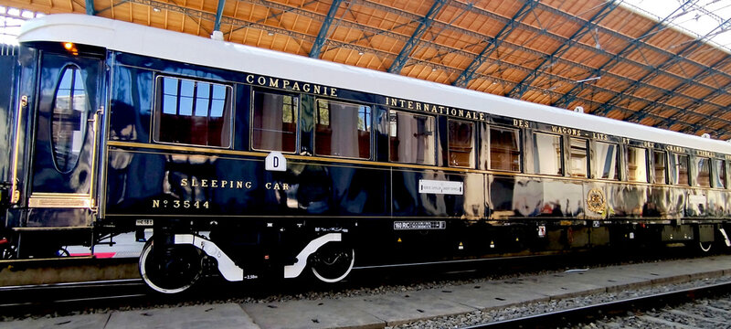Budapest, Hungary - 05.02.2026: closeup of the famous Orient Express train. the Western train station. shiny black carriage with reflection. Vintage look. gilded lettering. Sleeping Car. Antique style