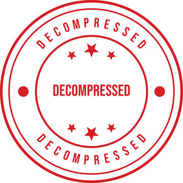 Bold red circle stamp showing the word DECOMPRESSED centered clearly on a plain white surface