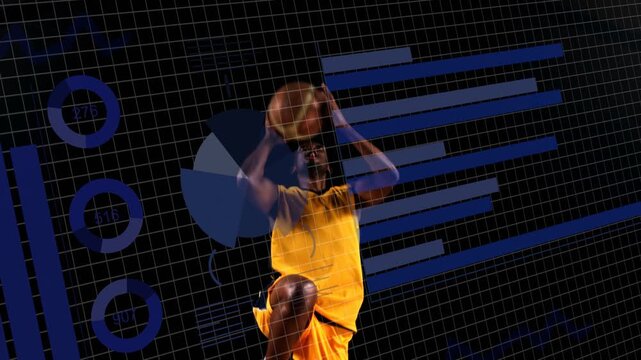 African American man dribbling basketball and jumping in yellow jersey on grid with blue charts