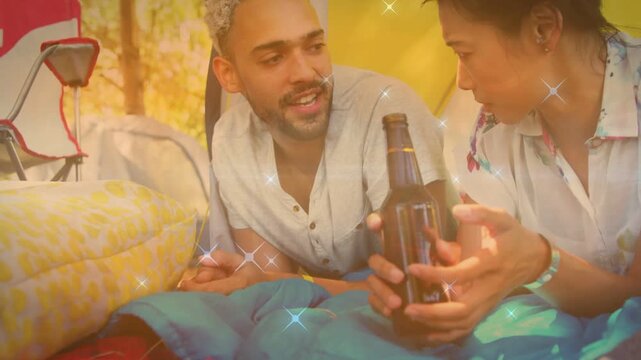 Man starting speaking in tent, woman reaching bottle, sparkles highlighting shared drink for travel