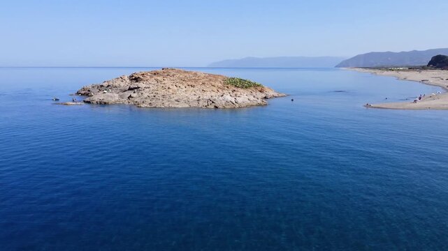 Aerial Nature Mediterranean sea Landscape with Turquoise Sea or Ocean Bay and Empty Sand Beach. Beautiful Vacation and Tourism Destination Drone top view summer day in Jijel Algeria.