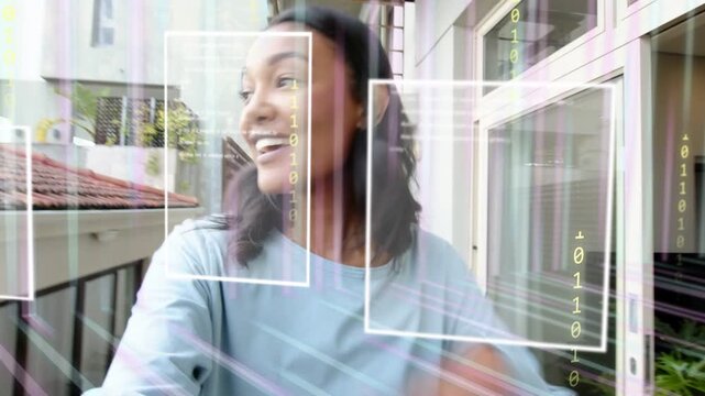Woman pressing record with phone walking onto balcony gesturing while AR overlaying torso for vlog