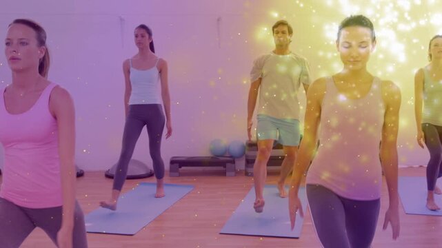 Yoga class cueing lunging and standing for breath on blue mats while gold overlay obscuring right