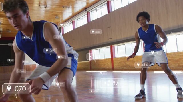 Player guarding basketball dribbling while guard reaching social icons popping mate shooting aiming