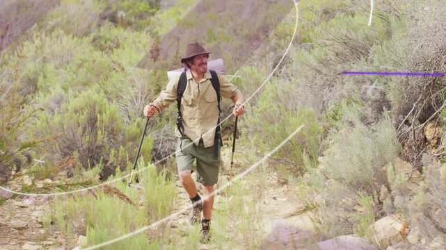 Hiker hiking trail planting poles scanning movement making white purple streaks for outdoor travel