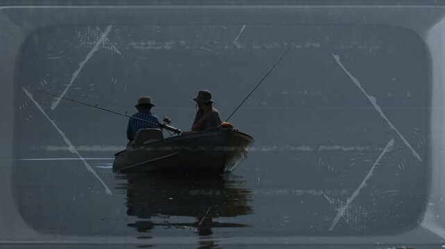 Light wind nudging boat, two men fishing for leisure, approaching camera, film scratches overlaying