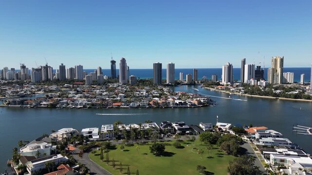 Aerial view Gold Coast Australia. Beautiful cityscape of skyscrapers surrounded by ocean bays.