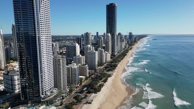 Aerial view of the cityscape on the ocean coast of Gold Coast Queensland Australia. Skyscrapers on the Pacific coast, modern urban architecture travel and tourism.