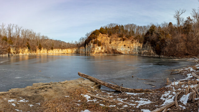 Winter landscape of a water filled abandoned quarry near the Katy Trail State Park in St. Charles County Missouri