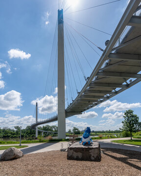Omaha, Nebraska: OMAR the troll under the Bob Kerrey Pedestrian Bridge footbridge across Missouri River between Council Bluffs, Iowa, and Omaha, Nebraska. Omaha Metro Area River. 