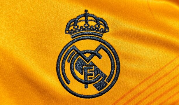 Photo of the embroidered emblem of Real Madrid club de Futbol on the 2024&ndash;2025 away kit. Real Madrid is a Spanish professional football club based in Madrid. 